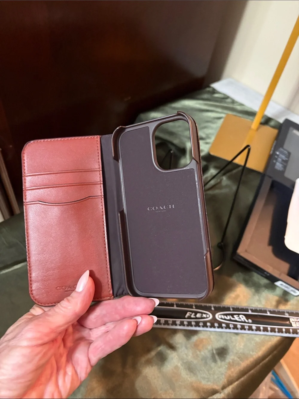 Coach Signature Folio Phone Case in Brown and Tan